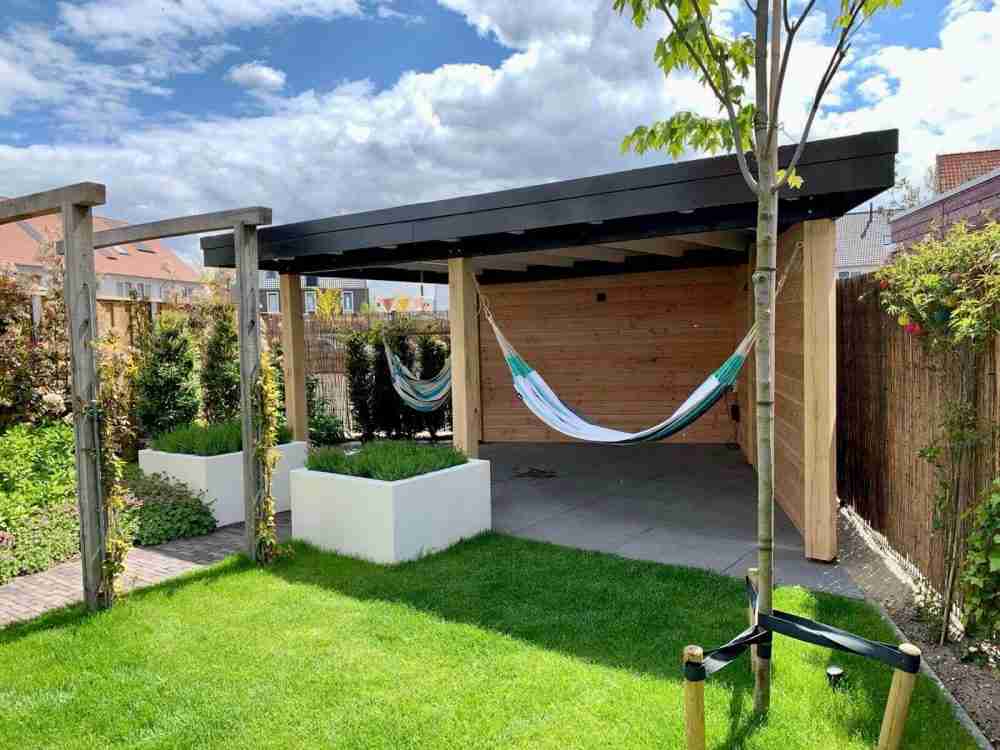 hovenier in Ermelo: tuinontwerp-levendig-gezellig-hangmat-veranda